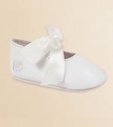 A soft satin bow ties a pretty leather style for a beautiful baby. Leather lined Padded insole Nubuck suede outsole with Ralph Lauren embroidery Imported