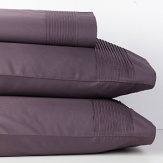 Lustrous and luxurious, the Modern Classics collection brings sophisticated style to any bed, with flexible pieces that complement one another. Fitted sheet crafted from long-staple cotton sateen with an 18 all-around elastic pocket to fit most luxury mattresses.