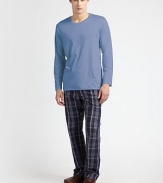 An easy-wearing tee is shaped in fine cotton interlock for a smooth finish for lounging and layering alike. CrewneckCottonMachine washImported