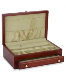 Fill this cherry wood jewelry chest with your favorite pieces to prevent accidental damage and loss. Polished brass pulls accent the cover and drawer while imitation suede in aloe adds a touch of luxury to the interior. Fill this cherry wood jewelry chest with your favorite pieces to prevent accidental damage and loss. Polished brass pulls accent the cover and drawer while imitation suede in aloe adds a touch of luxury to the interior.
