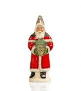 Santa Claus hand delivers a bit of Christmas sparkle to your home in this handcrafted figurine. A classic red coat design is accented with black for a touch of contemporary charm. From Vaillancourt.