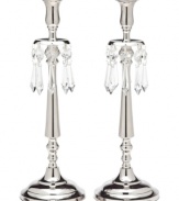 Rekindle the elegance of another era with silver-plated candlesticks from Lighting by Design. Faceted crystal beads adorn a stately silhouette, creating instant drama in a living or dining room.