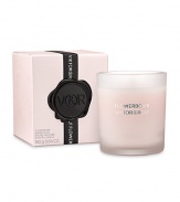 The newest addition to the Flowerbomb Bomblicious Collection. The opulent and full-bodied Flowerbomb fragrance can now also be cherished within your home with the Flowerbomb Bomblicious Scented Candle. The inviting aroma, in a delicately pink frosted glass, is the perfect addition to light and fragrance your entire home. The candle is at a 15% fragrance level for a premium offering and a qualitative rendition of the Eau de Parfum. Burn time is about 35 hours. 5.4 oz.