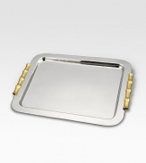 A modern statement in style combines organic elements with a sleek, stainless steel silhouette. Each bamboo accent is hand-gilded with 24k gold and soldered with sterling silver. From the Bambou CollectionStainless steel with 24k goldplate21 X 16½Hand washImported