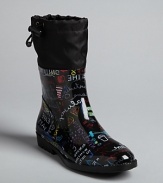 Add some colorful whimsy when gray skies loom in these fun and functional DKNY rain boots, with an eye-catching graffiti print.