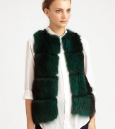 Colorful raccoon fur adds a little edge to a sumptuous vest in a sleeveless, open-front silhouette.Dyed raccoon furCollarlessSleevelessHook-and-eye closureSilk liningSpecialist dry cleanMade in USAFur origin: USA