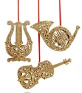 Play a sweet tune. Ring in the holiday season with the golden glimmer of these Musical Instrument ornaments. With red ribbon hanging thread.
