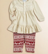 A pretty and festive set pairs a ruffled and lace-trimmed Henley tunic with a printed stretch cotton legging. Tunic Lace-trimmed crewneckLong puffed sleevesButton-frontRuffled hem Leggings Elastic waistbandTapered legCottonMachine washImported Please note: Number of buttons may vary depending on size ordered. 