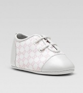 Lace-up style in soft cotton featuring allover mini GG print and leather trim.Cotton upper Lace-up closure Leather sole Made in Italy Additional InformationKid's Shoe Size Guide (European Equivalent) 