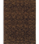 Crafted to impart a vintage wear and lush visual texture, this Karastan rug features subtle fabric-like patterning inspired by the organic designs found in granite and marble. Machine woven from 100% wool in a rich espresso hue.