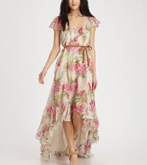 Lush florals bloom on silk chiffon in this oh-so-feminine frock finished with soft ruffles and a high-low hem.Square neckline with V notchShort flutter sleevesSkinny beltRuffled hemScoopbackAbout 54 from shoulder to hemSilkDry cleanImportedModel shown is 5'10 (177cm) wearing US size 4.