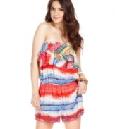 Score beach betty style in this vibrant romper from American Rag! Tiers of ruffles and a colorful print create tropical cool,  while a slouchy-chic fit calls for total relaxation!