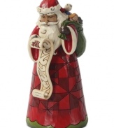 Ready to spread Christmas cheer, Santa is back at his list, checking it twice and getting ready to give toys to the nice. This folk-inspired figurine adds whimsical detailing, like a contrasting geometric design, to Santa's traditional getup.