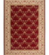 Outfit your home in old-world elegance. A wonderfully ornamental European-inspired motif with vines and blossoms gives this hand-carved wool rug a look of fine-tuned beauty. Soft and inviting in vibrant burgundy, the rug is an inspired choice for living areas and dining rooms.