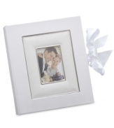 Showcase your treasured memories with a true treasure. The Opal Innocence album features a delicate vine pattern accented by matte and polished silver. Holds 160 4x6 photos. Qualifies for Rebate