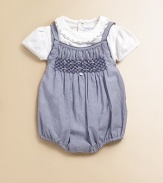 Classic stripes and a pretty smocked bodice add a splash of color to this charming bodysuit.Straight necklineStraps with back button closureSmocked bodiceBottom snapsCottonMachine washImported Please note: Number of snaps may vary depending on size ordered. 