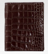 Crafted of crocodile-embossed Italian calfskin, it includes 5 credit card slots and passport compartment. 4½ X 5½ Made in USAFOR PERSONALIZATIONSelect a color and quantity, then scroll down and click on PERSONALIZE & ADD TO BAG to choose and preview your personalization options. Please allow 1 week for delivery.