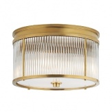 With its timeless, radiant design, this Ralph Lauren flush mount lamp is an ideal way to lend luxurious light to smaller spaces.