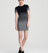 This Cut25 pullover sweater dress boasts a unique ombre pattern on a body-con silhouette for cozy chic.