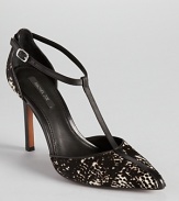 Black, white and spotted all over, Rachel Zoe's calf hair Karolina pumps show off a unique t-strap silhouette that extends along a pointed toe.