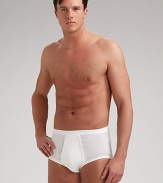 Classic full briefs in lightly ribbed mercerized cotton, a soft fabric of exceptional quality. Elastic waist. Machine wash. Imported. 