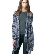 Go long this fall with this cozy knit cardigan enriched by a classic Fair Isle print.