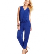 Drape yourself in effortless cool with this jumpsuit from GUESS?. A comfy, slouchy fit and tapered leg makes this one-piece a super stylish look for your vacation or stay-cation!