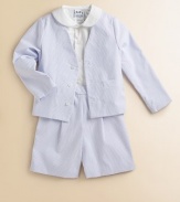 An adorable preppy seersucker set includes a crisp button-down shirt