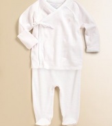 Adorable kimono-style top and pants in soft cotton jersey.V-neck with hidden snapLong sleeves with fold-over detailWrap-front with side tieSnaps on hemFooted bottomCottonMachine washImported Please note: Number of snaps may vary depending on size ordered. 