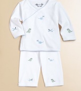 A kimono top, matching pants and embroidered dinosaurs, finished with picot trim makes for a cozy design. V-neck Long sleeves Side snap closure Elastic waist Cotton Machine wash Imported