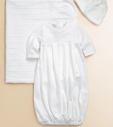 Wrap your baby in this ultra soft gown made of fine cotton.CrewneckCrocheted bodiceLong sleevesEmpire waist with soft pleatsBack button closureElastic banded hemCottonMachine washImported