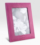 Display your memories in this handmade frame, wrapped in python-embossed leather with sturdy metal easel and convenient rear drop-down door for easy access.LeatherMade in USA DIMENSION INFORMATION 4 X 65 X 7