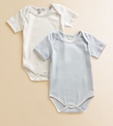 Comfy baby basics in soft cotton knit, offering one dot and one solid design.Envelope shoulders for easy on and off Short sleeves Snap bottom Cotton; machine wash Imported