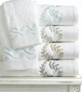 All natural. Fresh white cotton bath towels embroidered with delicate scrolling vines give the Trousseau Leaf wash cloth an easy, timeless elegance. With the impeccable styling of Martha Stewart Collection.