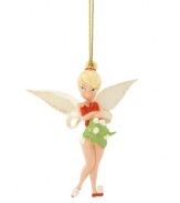 A determined Tinkerbell waits for her mistletoe moment in this dream-come-true Christmas ornament for kids and adults alike. With a dusting of gold in her wings and a festive holiday party frock. Qualifies for Rebate