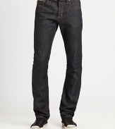 Raw indigo-rinsed denim classic in a slim-leg silhouette, with folded back pocket detailing and enlarged, logo-branded button shanks.Five-pocket styleButton flyInseam, about 35CottonMachine washImported