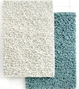 Treat your toes to texture! The Loopi bath rug boasts generous cotton loops that make your steps to and from the shower a dream. Features a latex back.