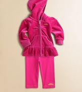 This adorable, coordinating set includes a zip-front hoodie with ruffled hem and matching sweatpants for a sporty, yet girly, ensemble. Hoodie Attached hoodLong sleevesFull-zip frontRibbed cuffs and hemSplit kangaroo pocketRuffled hem Pants Elastic waistband94% cotton/6% spandexMachine washImported