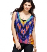 Wake up your neutral jeans with an explosion of color, via this painterly, bohemian-cool top from Rampage!