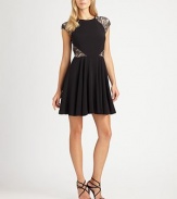 Lovely lace insets add a romantic look to this crepe dress with a touch of stretch for a flawless fit.Round neckCap sleevesLace insetsFlared skirtConcealed back zipperFully linedAbout 35 from natural waistBody: polyester/spandexLace: nylonDry cleanImportedSIZE & FIT Model shown is 5'10½ (179cm) wearing a US size 4. 