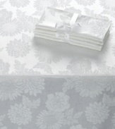 Ready for anything. With a tablecloth and napkins for up to four guests, this Dinner Party Medley table linens set offers efficiency for the busy host and a classic white floral motif to make any meal elegant.