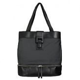 Washable coated linen tote with cowhide leather trim. Separate bottom compartment fits a pair of shoes and other travel items. Straps fit over shoulder. Interior organization pockets. Magnetic closure. Lined.