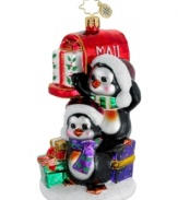 Special delivery! Two cute penguins post festive holiday packages from (way) down south in this adorable Polonaise ornament from Christopher Radko.
