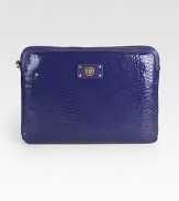 Luxe python-print patent leather zips around your laptop for a stylish cover.Zip-around closureFully lined13½W X 10H X 3/4DImportedBoxed for giving