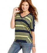 Panels of asymmetrical stripes at the sides add cool variation to this comfy-casual top from Tommy Girl!