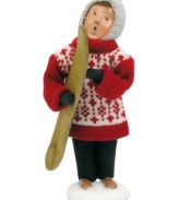 He's graduated from the bunny slopes and now this snowboarder, clad in a can't-miss Christmas sweater, stands in awe of the snow-capped mountains around him. The perfect Byers' Choice figurine for ski- and snowboarding families!