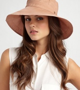 Wide brim cotton organdy with pleated crown and split back brim is perfect for travel or a day at the beach.Adjustable drawstring ties One size fits most Brim, about 4 wide Cotton; dry clean Imported 