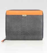 Zip your iPad™ into this ultra-sleek case crafted from rich python-embossed leather.Zip-around closureOne outside open pocketThree inside open pocketsPolyester lining10¼W X 9H X 1/2DImported