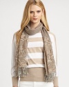 Eye-catching embroidery adds a whimsical look to this fringed wool design.WoolAbout 25 X 66½Dry cleanImported