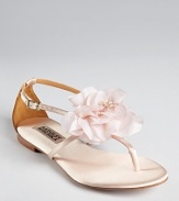 Who says flats can't be dressed up? These floral Badgley Mischka sandals look as perfect at formal events as high heels--a garden party or beach wedding's dream.